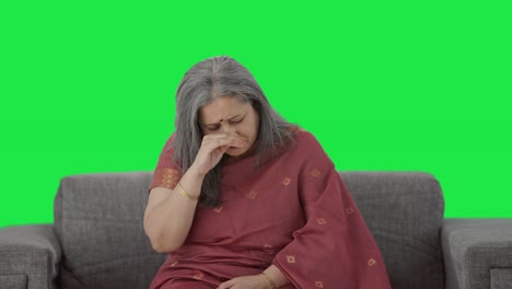 Sick-Indian-old-woman-suffering-from-cold-and-cough-Green-screen