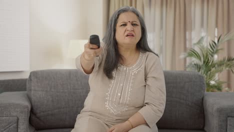 Indian-old-woman-watching-TV