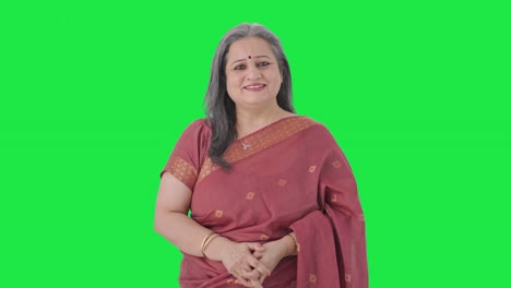 Happy-Indian-old-woman-smiling-to-the-camera-Green-screen