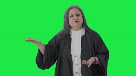 Angry-Indian-senior-female-lawyer-fighting-the-case-in-court-Green-screen