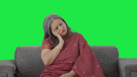 Sick-Indian-old-woman-suffering-from-tooth-pain-Green-screen