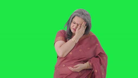 Sick-Indian-old-woman-having-a-headache-Green-screen