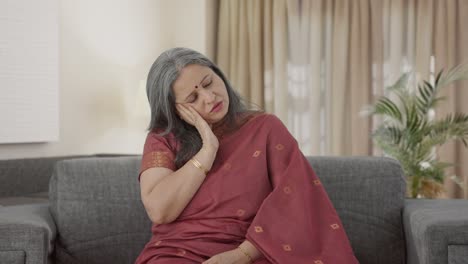 Sick-Indian-old-woman-suffering-from-tooth-pain