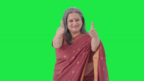 Happy-Indian-old-woman-showing-thumbs-up-Green-screen