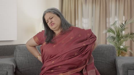 Sick-Indian-old-woman-suffering-from-back-pain