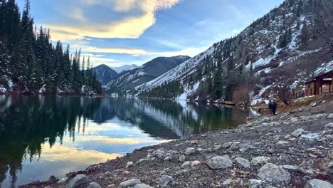 lake-with-mirror-water-at-sunset