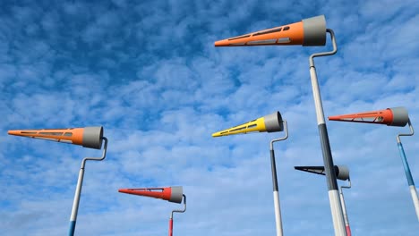 Close-up-of-Akau-Tangi-wind-sculpture-on-the-waterfront-of-capital-city-of-Wellington,-New-Zealand-Aotearoa-against-sunny-blue-sky