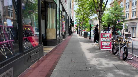 Walking-down-George-Street-In-New-Brunswick,-NJ