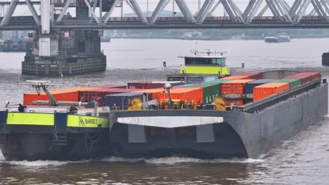 Intermodal-Containers-Loaded-In-Hydrogen-powered-Inland-Ship-On-River-In-Dordrecht,-Netherlands