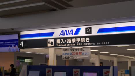 Static-shot-of-the-ANA-check-in-counter-sign-at-Kobe-Airport