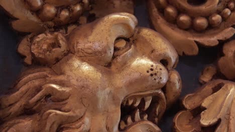 Close-up-of-a-detailed-lion-carving-at-the-museum-in-Valletta,-Malta