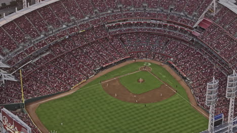 Cincinnati-Ohio-Aerial-v71-zoomed-birds-eye-view-flyover-the-Great-American-Ball-Park-capturing-baseball-game-in-action,-surrounded-by-cheering-crowds---Shot-with-Mavic-3-Pro-Cine---September-2023