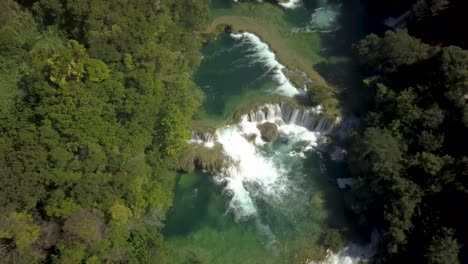 4K-Aerial-Long-Drone-Shot-Of-KRKA-Waterfall-in-Nationalpark---Sibenik,-Croatia-Tilt