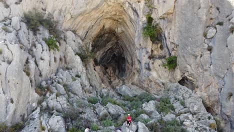 Massive-Cave-entrance-in-mountain-side-national-park-Murcia-Alicante-Spain-aerial