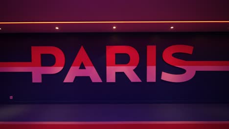 Paris-sign-at-Football-Parc-des-Princes-soccer-stadium-home-of-Paris-Saint-Germain,-Close-up-shot