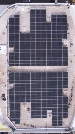 Vertical-Aerial-View,-Solar-Panels-Array-on-Top-of-Building-in-Downtown-San-Francisco,-California-USA