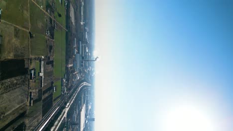 Vertical-aerial-shot-of-the-industrial-periphery-of-Linyi,-Shandong-Province,-China