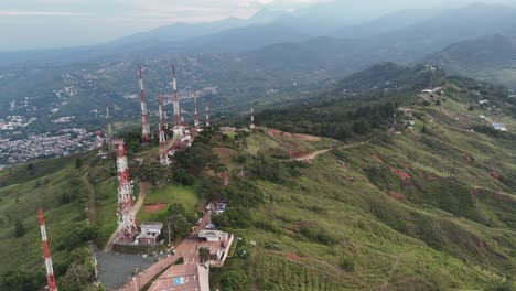 Broadcast-antennas-installed-on-the-mountaintops-of-Cali,-Colombia,-aerial-views