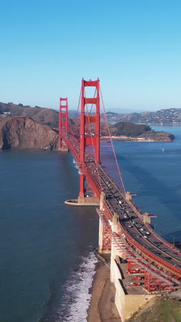 Vertical-Drone-Shot-of-Golden-Gate-Bridge,-San-Francisco,-California-USA,-Traffic-and-Bay-on-Sunny-Day