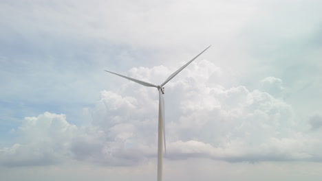 Offshore-Wind-Farm-Generator,-Aerial-View-Of-Clean-And-Renewable-Wind-Power-Farm-In-Motion