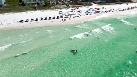 Aerial-View-Of-People-During-Summer-Holiday-Vacation-At-Seaside-Resort-In-Florida,-United-States