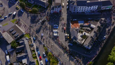 Aerial-static-shot-of-the-Pegasus-Parade-during-the-Arts-Festival-in-Galway,-Ireland