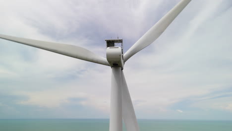 Perfect-Clean-Neutral-Wind-Turbine-Generator-Rotating-on-the-Ocean-Sea-Producing-Green-Clean-Renewable-Energy