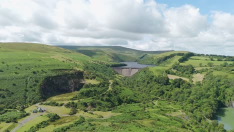 Aerial-view-of-Meldon-Reservoir,-situated-in-Dartmoor-National-Park-with-panoramic-views-over-Okement-Valley