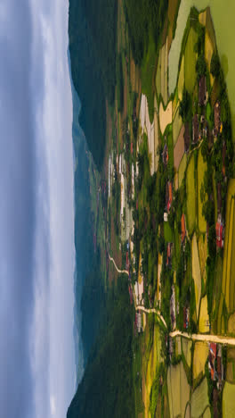 Dramatic-karst-landscape-and-flat-land-vivid-green-rice-paddies-of-Bac-Son-Valley,-Vietnam