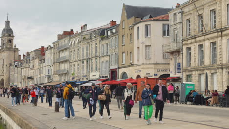 People-strolling-in-marina-of-La-Rochelle,-France