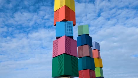 Urban-Forest-wind-sculpture-of-colorful-turning-blocks-on-the-waterfront-in-Wellington,-New-Zealand-Aotearoa