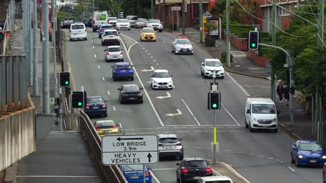 Vehicle-traffic-on-Milton-Road,-State-Route-32-in-Milton-suburb,-neighbourhood-in-the-inner-Brisbane-city