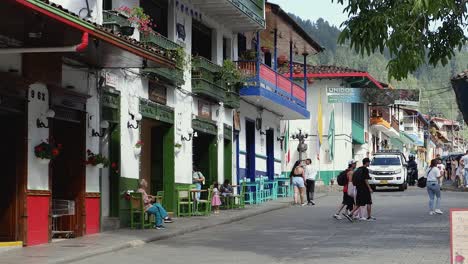 Cobblestone-street,-life-in-picturesque-town-of-Jardin,-Colombia