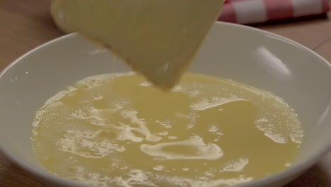 SOAKING-BREAD-IN-EGG-NOG-WITH-TWEEZERS