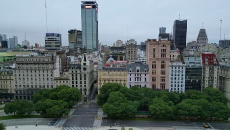 Daytime-aerial-view-over-Paseo-Colon-Avenue-showing-the-buildings-and-architecture-of-the-city-of-Buenos-Aires,-Argentina