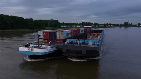 Container-Ship-SENTO-In-Barendrecht,-Netherlands---Aerial-Drone-Shot