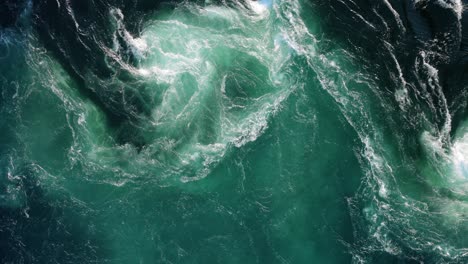 Blue-waves-of-water-of-the-river-and-the-sea-meet-each-other-during-high-tide-and-low-tide.