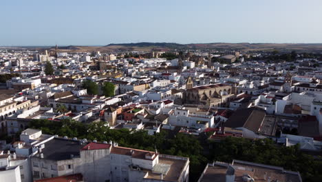 Aerial-Dolly-In-Over-Jerez-de-la-Frontera-with-Copy-Space,-Golden-Hour