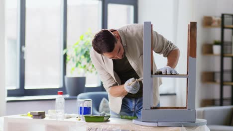 Father-and-Son-Painting-Old-Table-in-Grey-Color