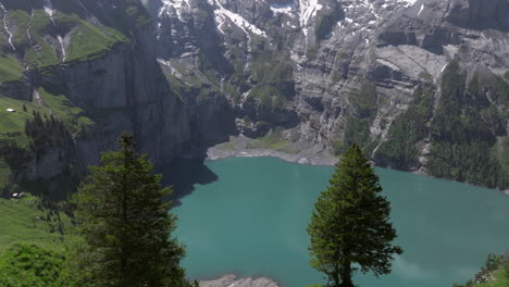 Idyllic-Scenery-Of-Oeschinen-Lake-In-Bernese-Oberland,-Switzerland---Aerial-Drone-Shot