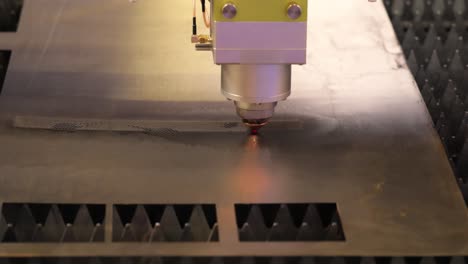 CNC-Laser-cutting-of-metal,-modern-industrial-technology.