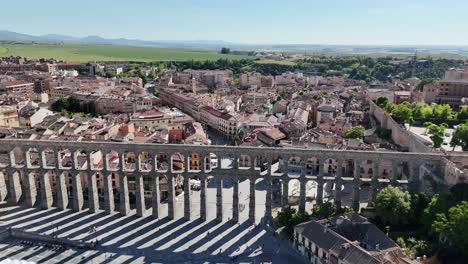 Ascending-drone,aerial-reverse--Aqueduct-of-Segovia-Spain