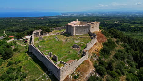 Drone-aerial-of-Chlemoutsi-medieval-Castle-fortress-Museum-landmark-in-countryside-region-valley-Clermont-South-Greece-Europe-travel-tourism-archaeology