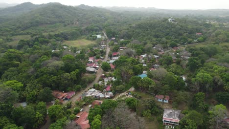 Aerial-view-of-serene-Santa-Catalina-rural-village-nestled-amidst-lush-green-landscapes-in-Panama