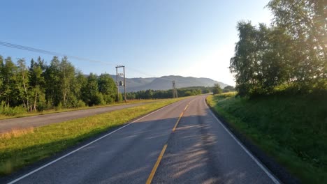 Driving-a-Car-on-a-Road-in-Norway.