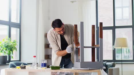 Father-and-Son-Painting-Old-Table-in-Grey-Color