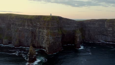 Aerial-orbit-captures-the-stunning-Cliffs-of-Moher-bathed-in-beautiful-morning-light