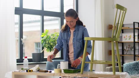 Woman-Stirring-Paint-for-Chair-Restoration