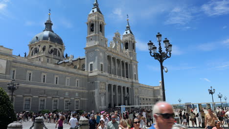 Many-Tourists-at-the-Plaza-in-Front-of-Almudena-Cathedral-in-Madrid