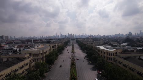 Drone-footage-of-traffic-in-bangkok-thailand-on-a-gloomy-day-with-cars-and-motorbikes